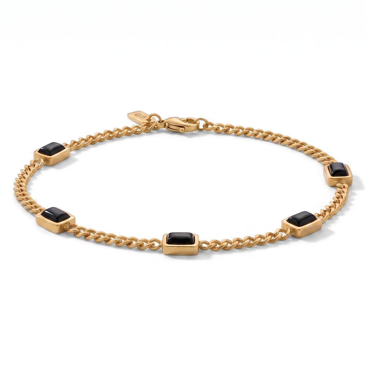 Gold chain men's bracelet with black rectangular stone accents and a plated 18K gold clasp on a white background