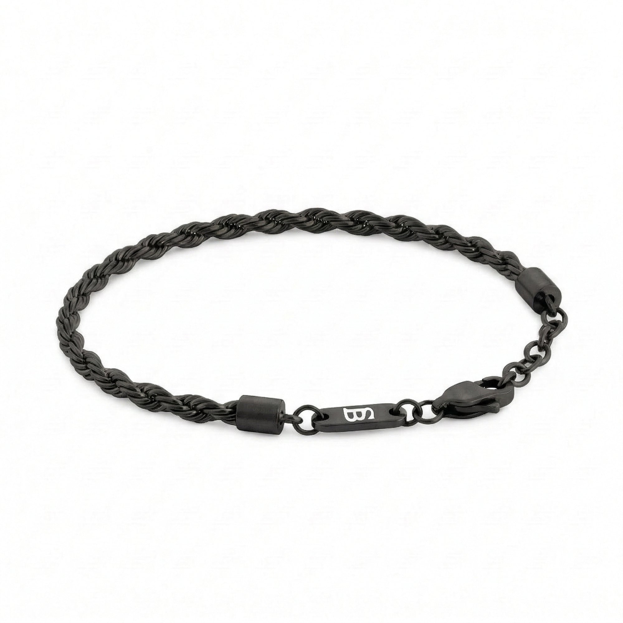 Black braided stainless steel men's bracelet with lobster clasp and small engraved tag detail displayed on a white background