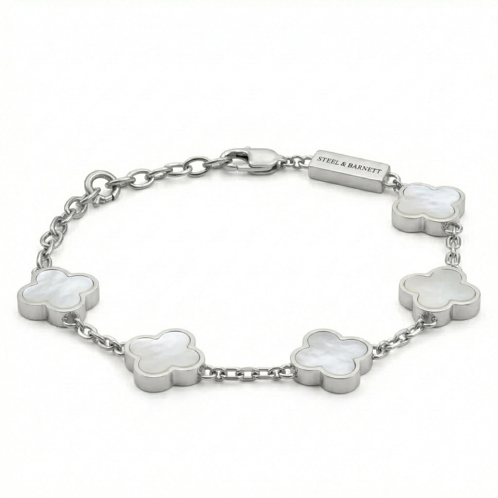 Silver toned men’s bracelet with white clover shaped inlays in stainless steel links and lobster clasp on a white background