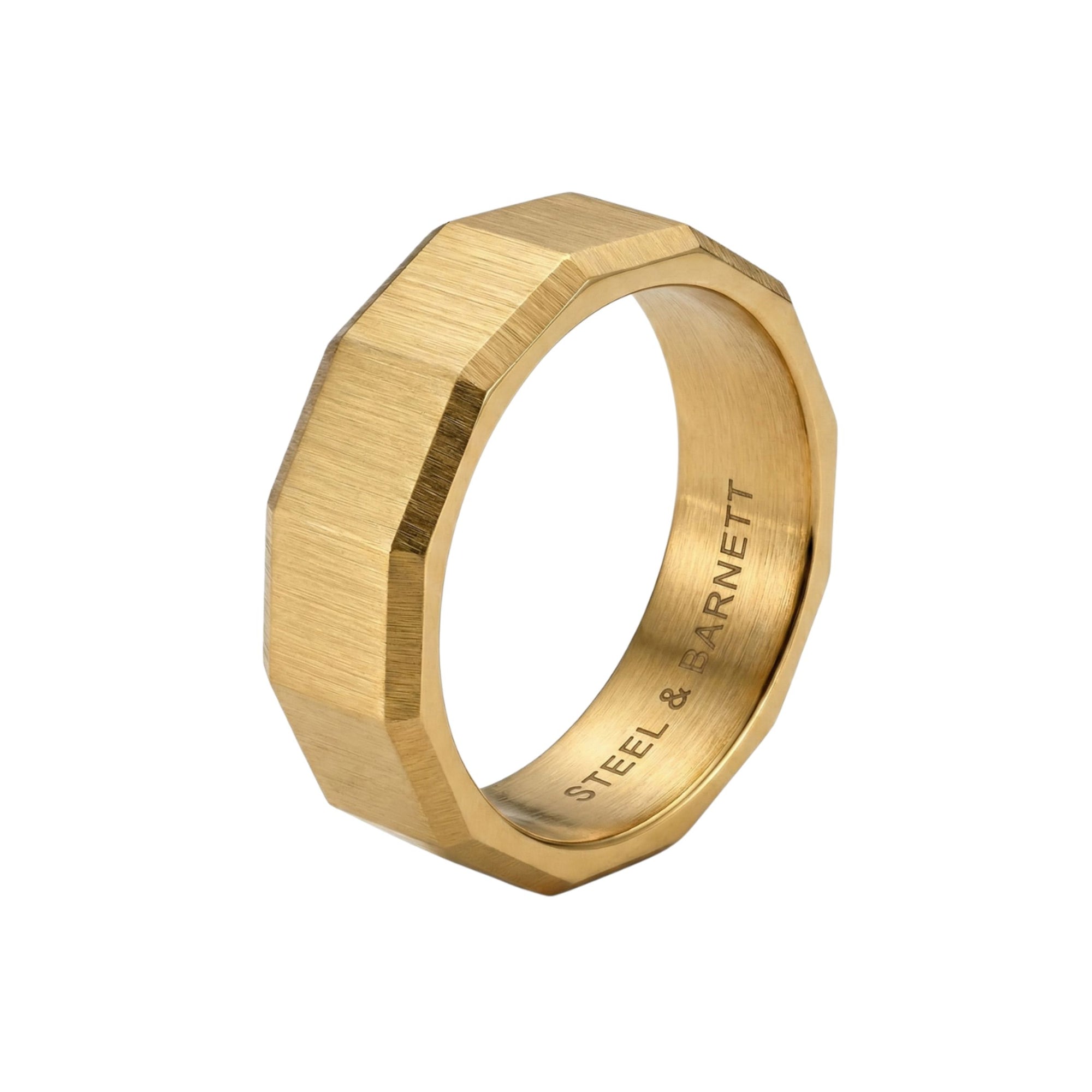 Gold stainless steel men's ring with a brushed geometric design isolated on a white background