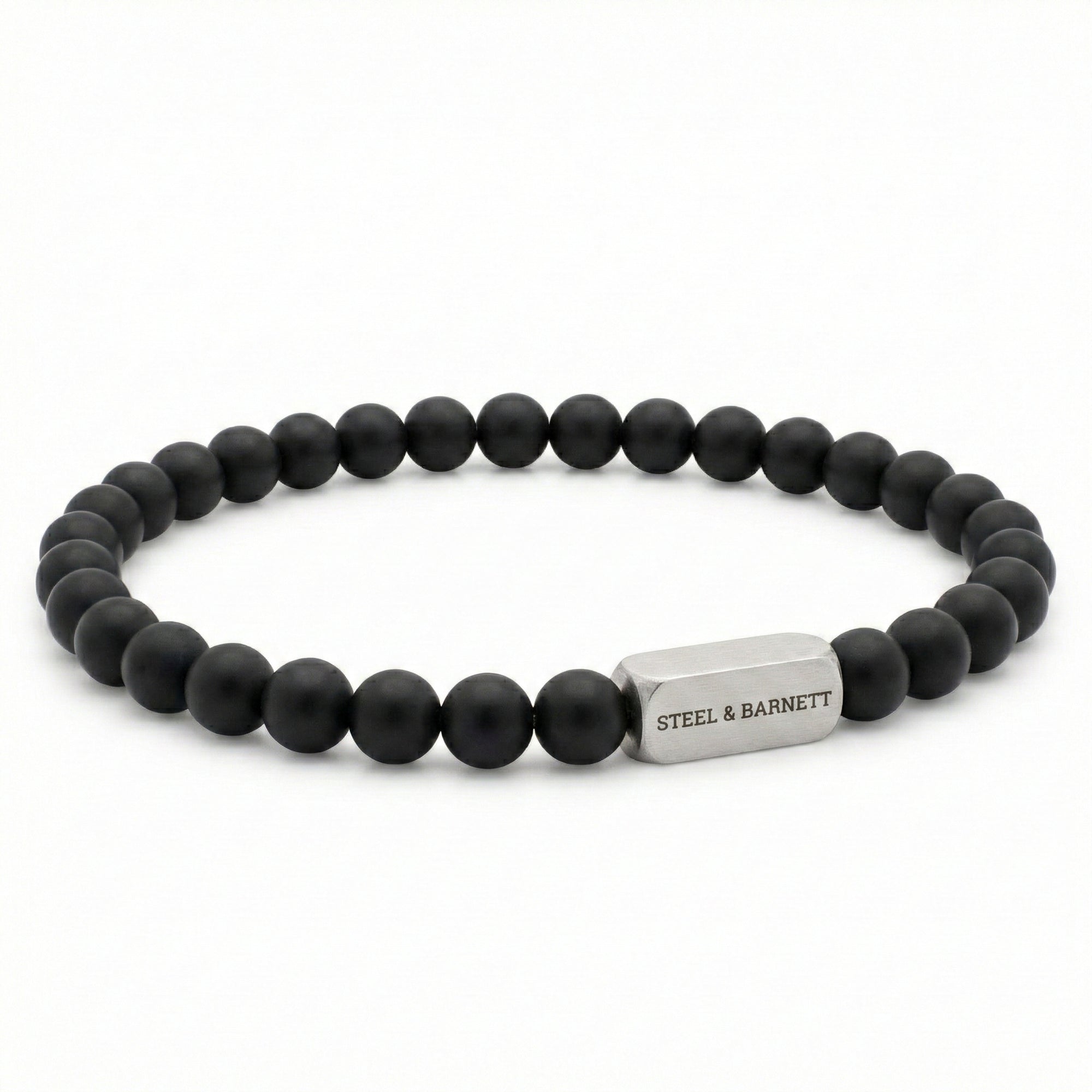 black beaded men’s bracelet with matte round beads and brushed stainless steel bar on white background