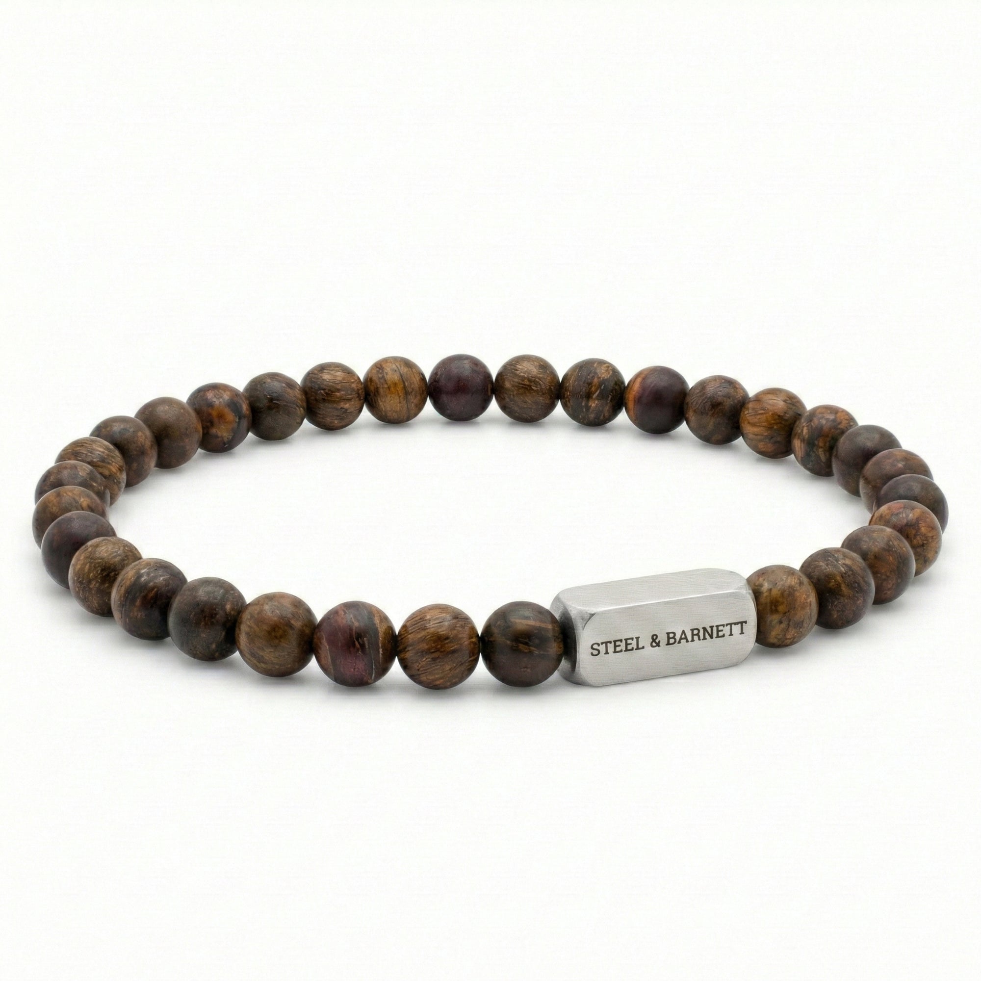 Bronzite beaded men’s bracelet with round brown natural stone beads and brushed stainless steel bar on white background