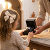 Girl gifting bracelets to her dad on father's day