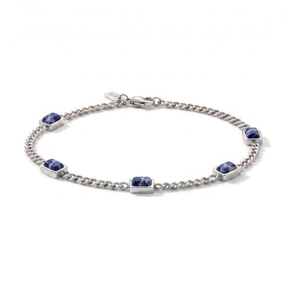 A silver chain bracelet featuring five rectangular blue sodalite stones set in polished silver bezels, displayed on a clean white background.