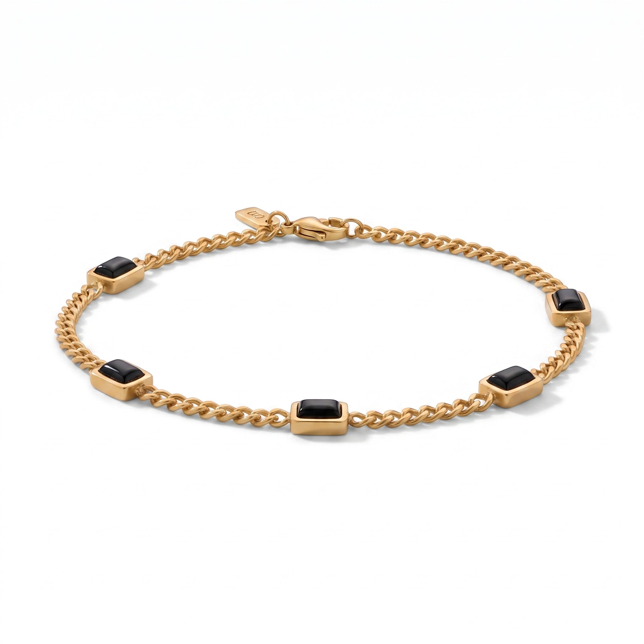 Gold chain men's bracelet with black rectangular stone accents and a plated 18K gold clasp on a white background