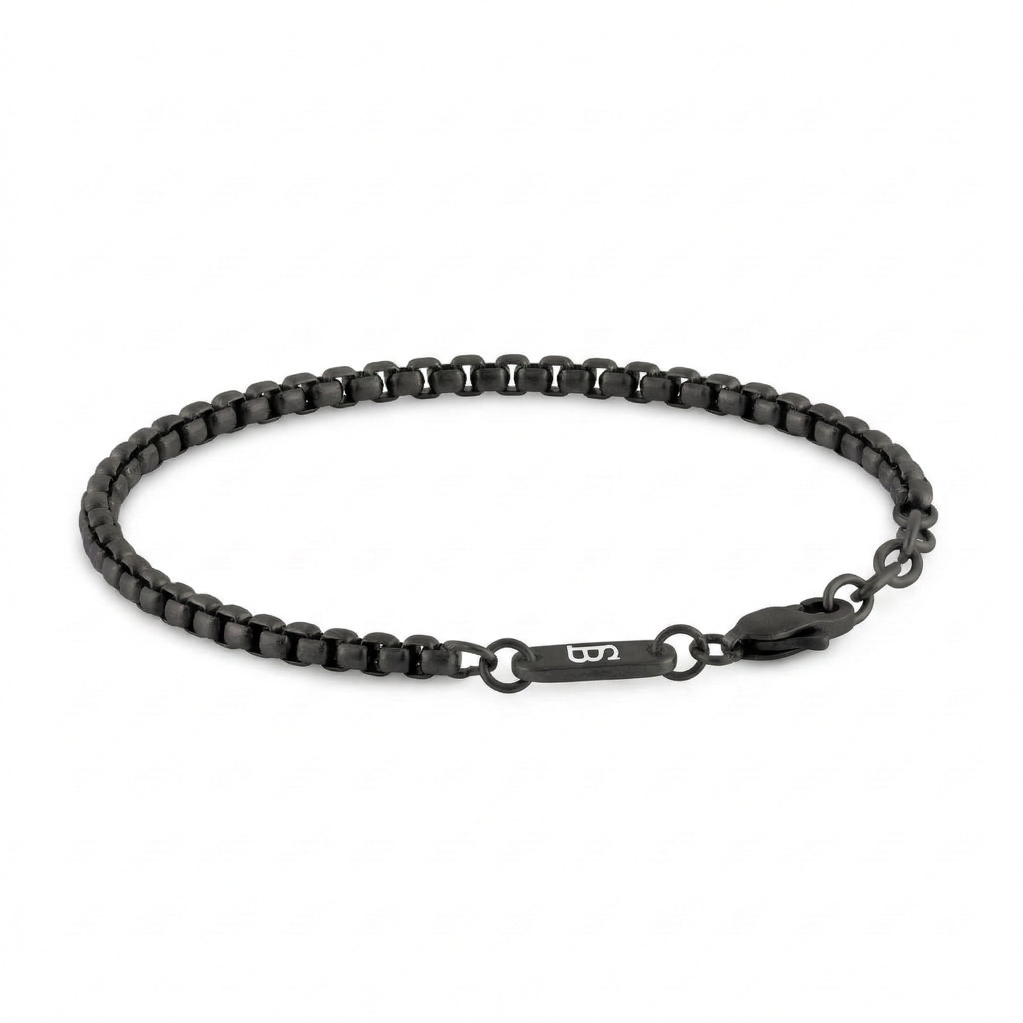 Black stainless steel men's bracelet with box chain links and lobster clasp with small engraved tag detail on a white background