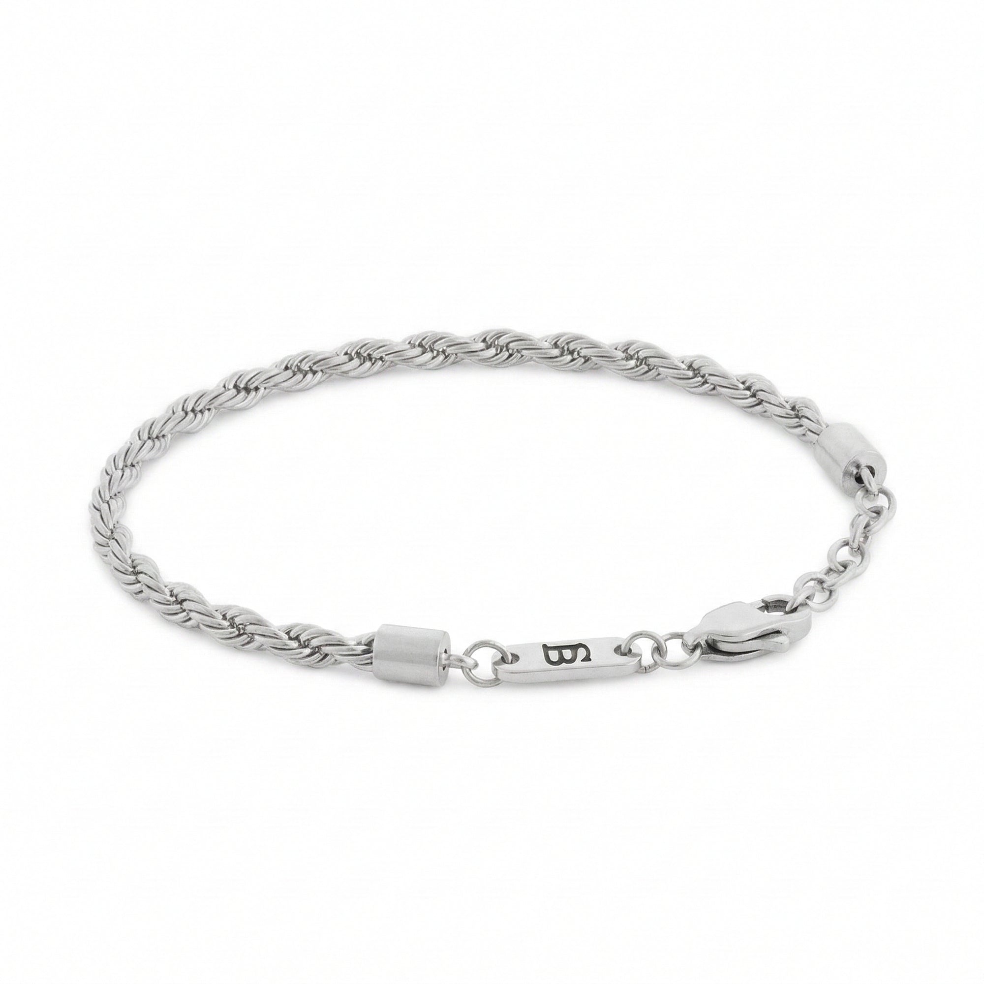 Silver braided stainless steel men's bracelet with lobster clasp and engraved tag detail displayed on a white background