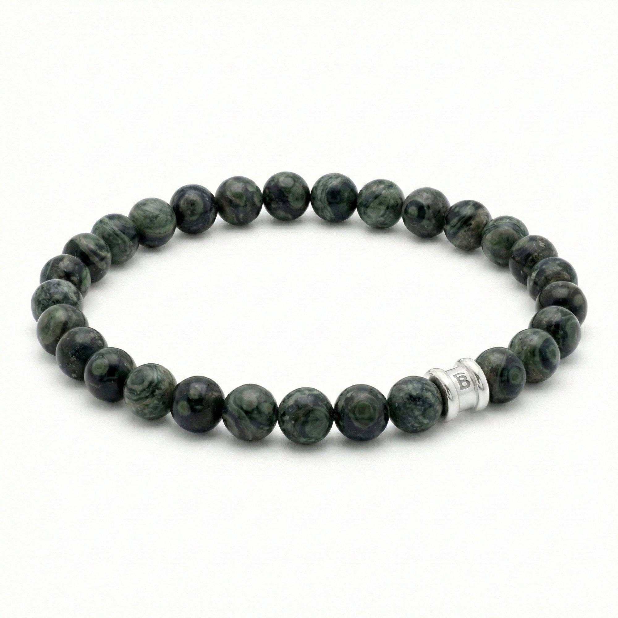 Dark green kambaba stone men's bracelet with smooth round beads and stainless steel accent on a white background