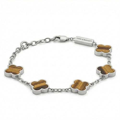 Silver toned men’s bracelet with brown clover shaped stone inlays in stainless steel chain and lobster clasp on a white background