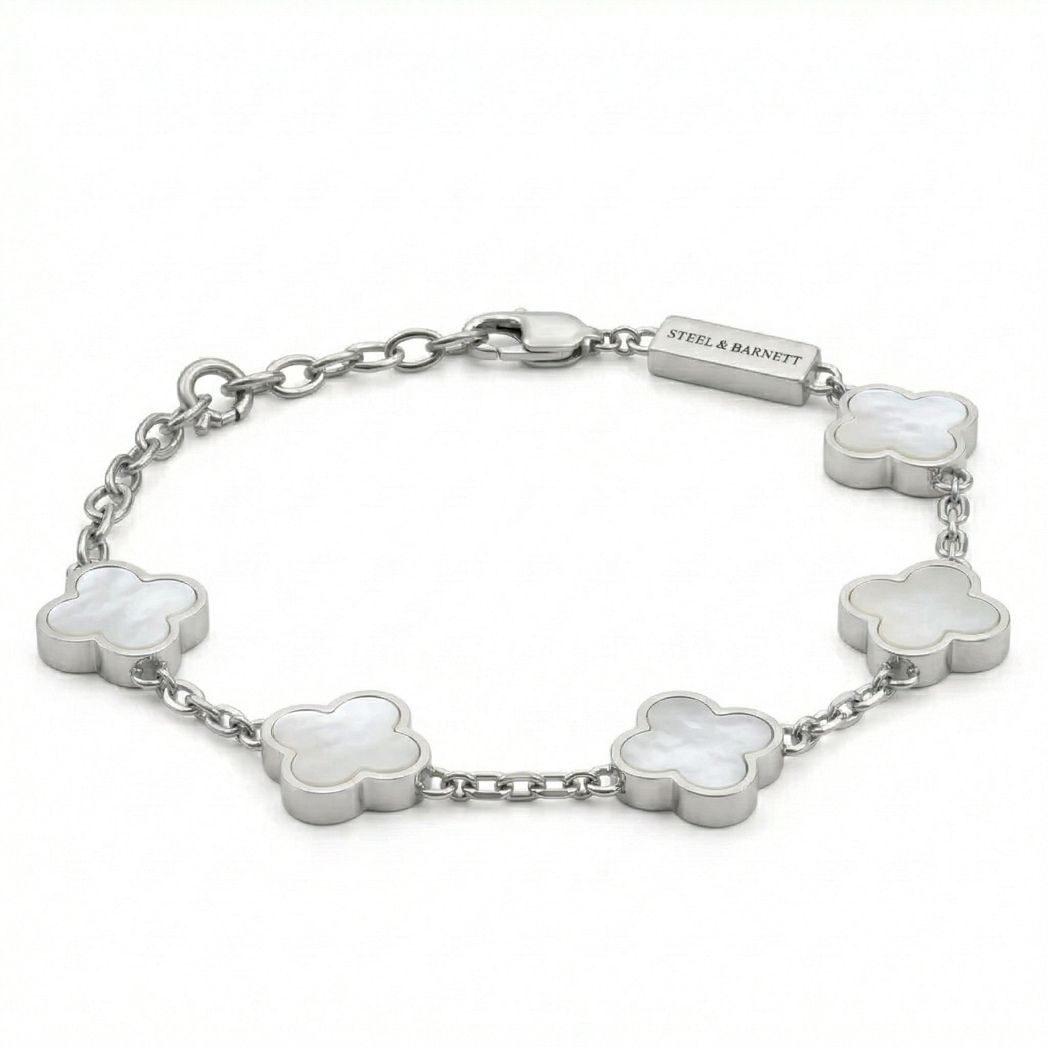 Silver toned men’s bracelet with white clover shaped inlays in stainless steel links and lobster clasp on a white background