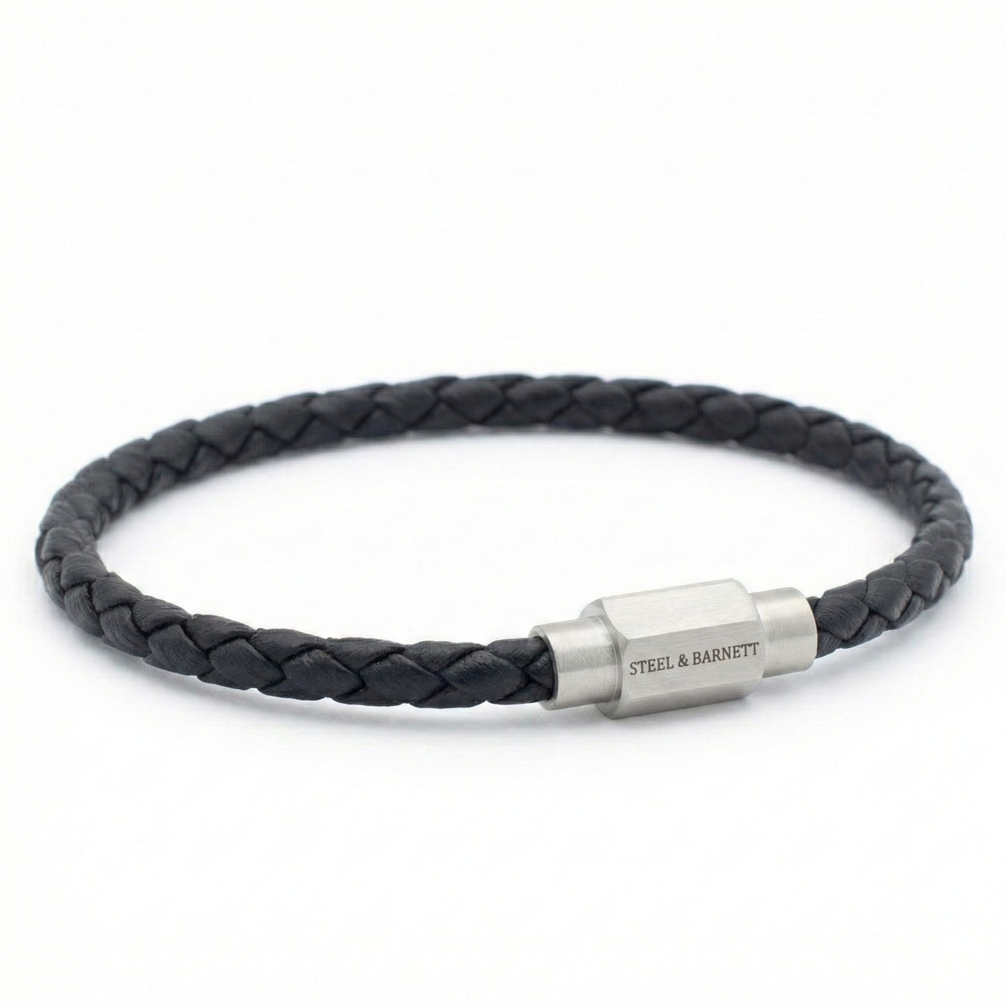 Black braided leather men’s bracelet with brushed stainless steel magnetic clasp on a white background