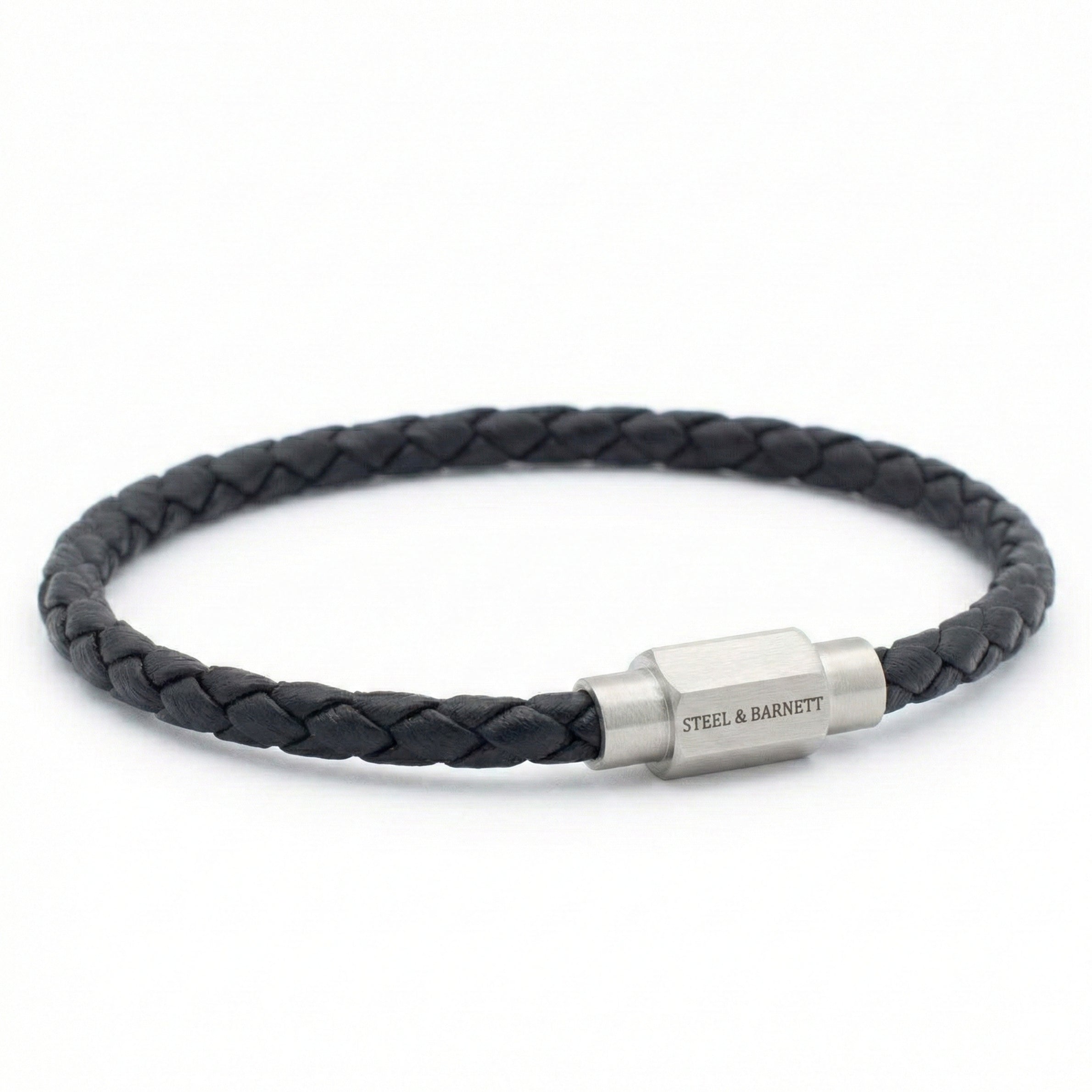 Black braided leather men’s bracelet with brushed stainless steel magnetic clasp on a white background