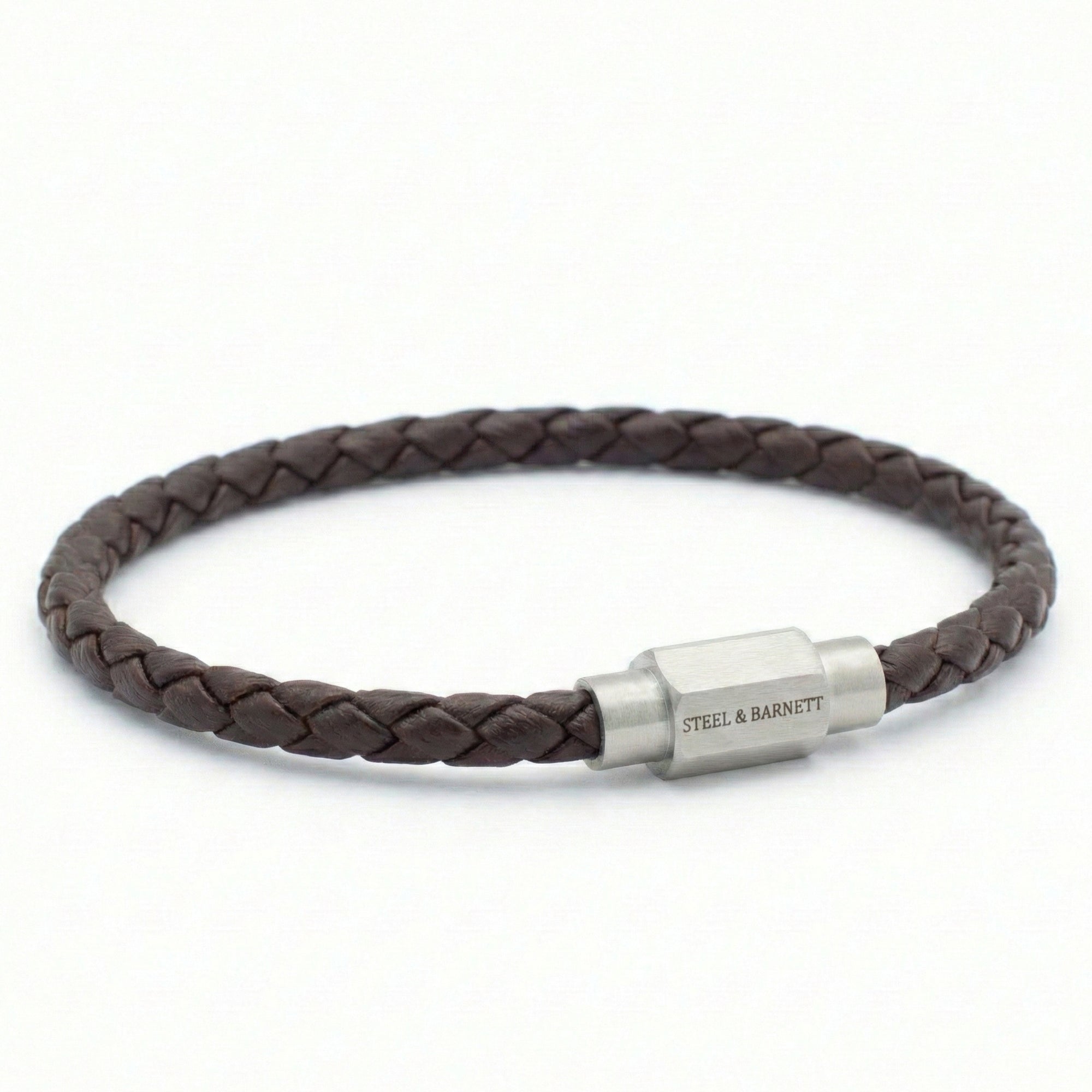 Brown braided leather men’s bracelet with brushed stainless steel magnetic clasp on a white background