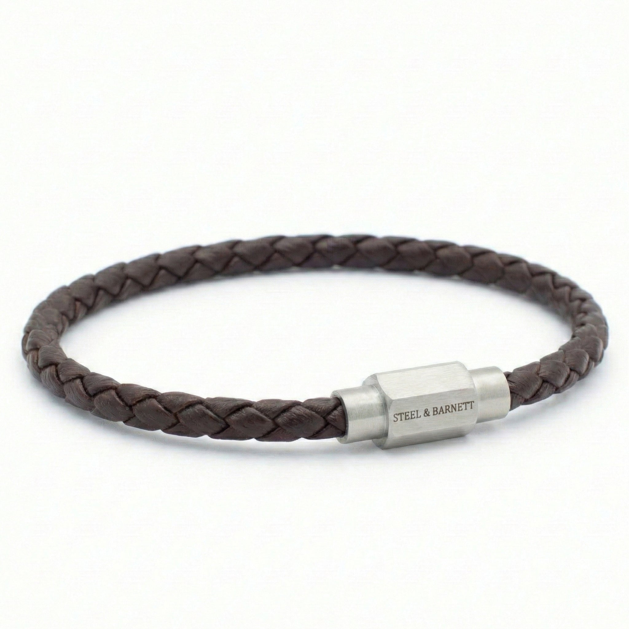 Brown braided leather men’s bracelet with brushed stainless steel magnetic clasp on a white background