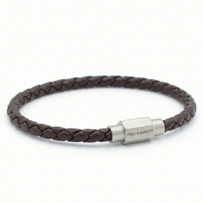 Brown braided leather men’s bracelet with brushed stainless steel magnetic clasp on a white background