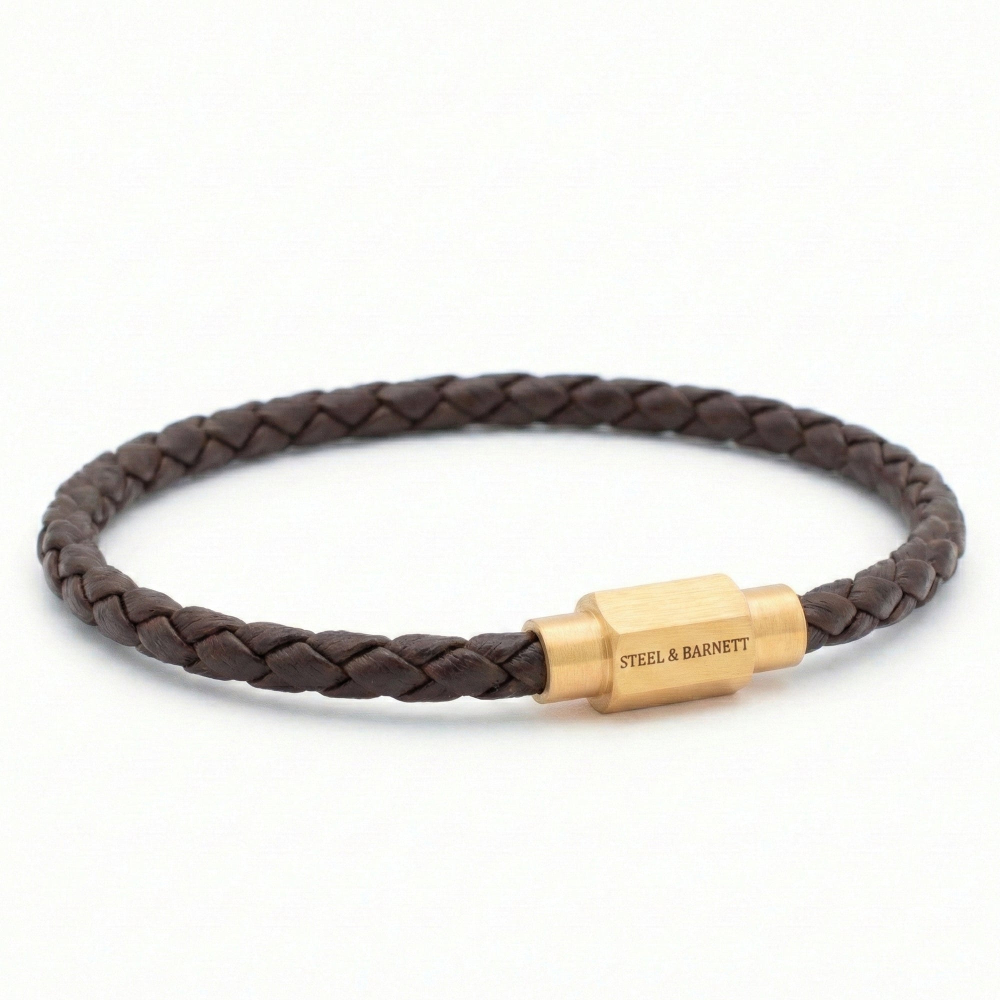 Brown braided leather men’s bracelet with plated 18K gold clasp on a white background