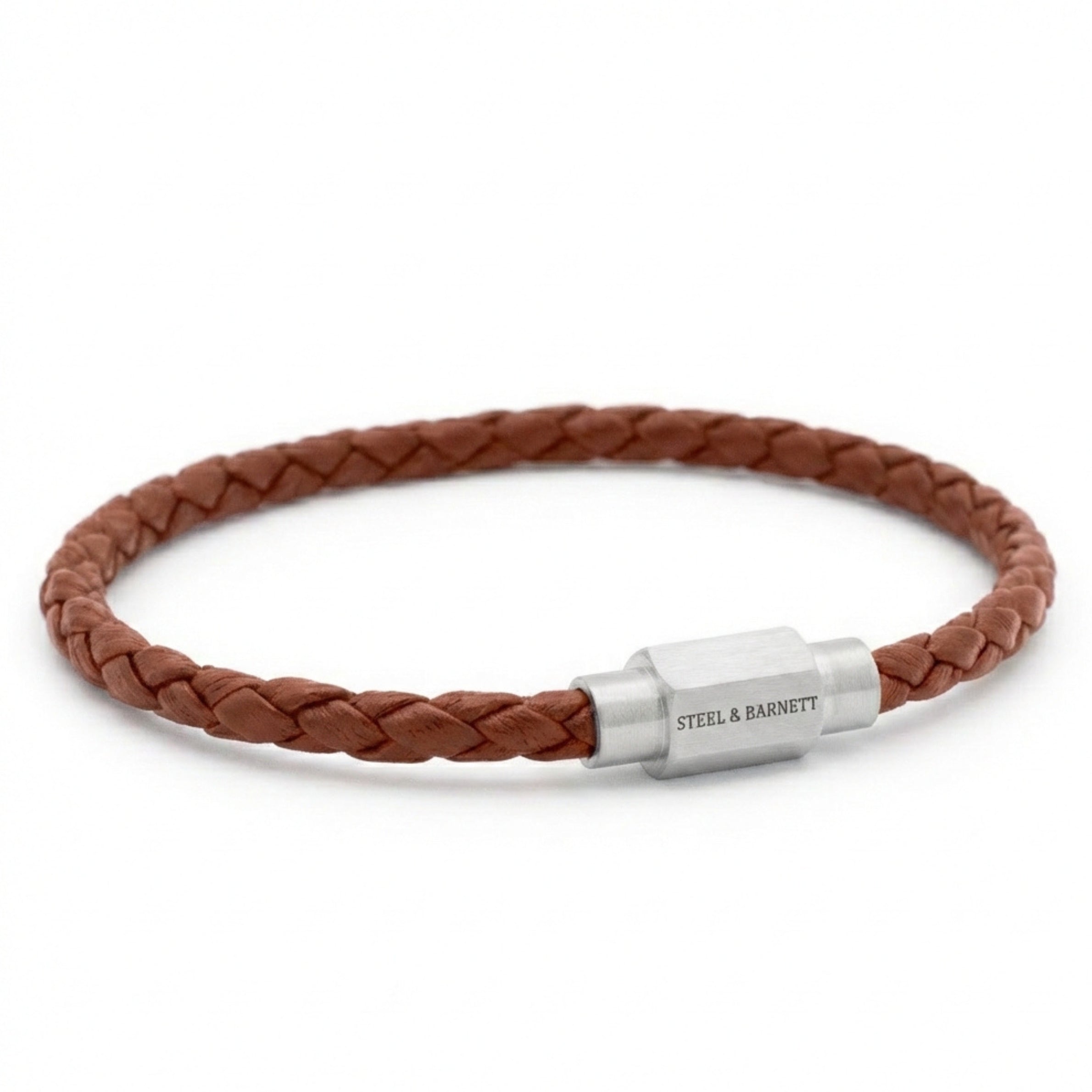 Cognac braided leather men’s bracelet with brushed stainless steel clasp on a white background