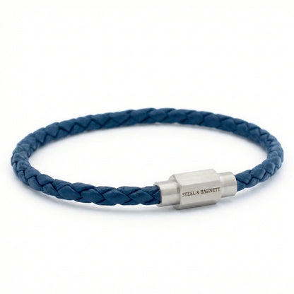 Blue braided leather men’s bracelet with brushed stainless steel clasp on a white background