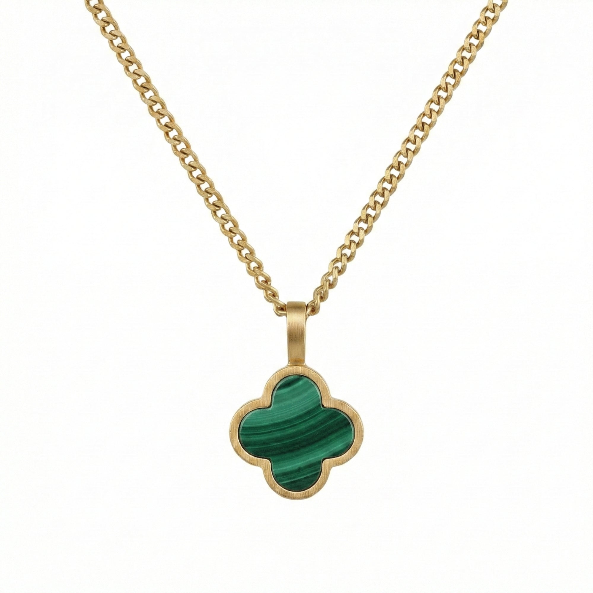 Gold necklace with a green Malachite clover-shaped pendant on a white background