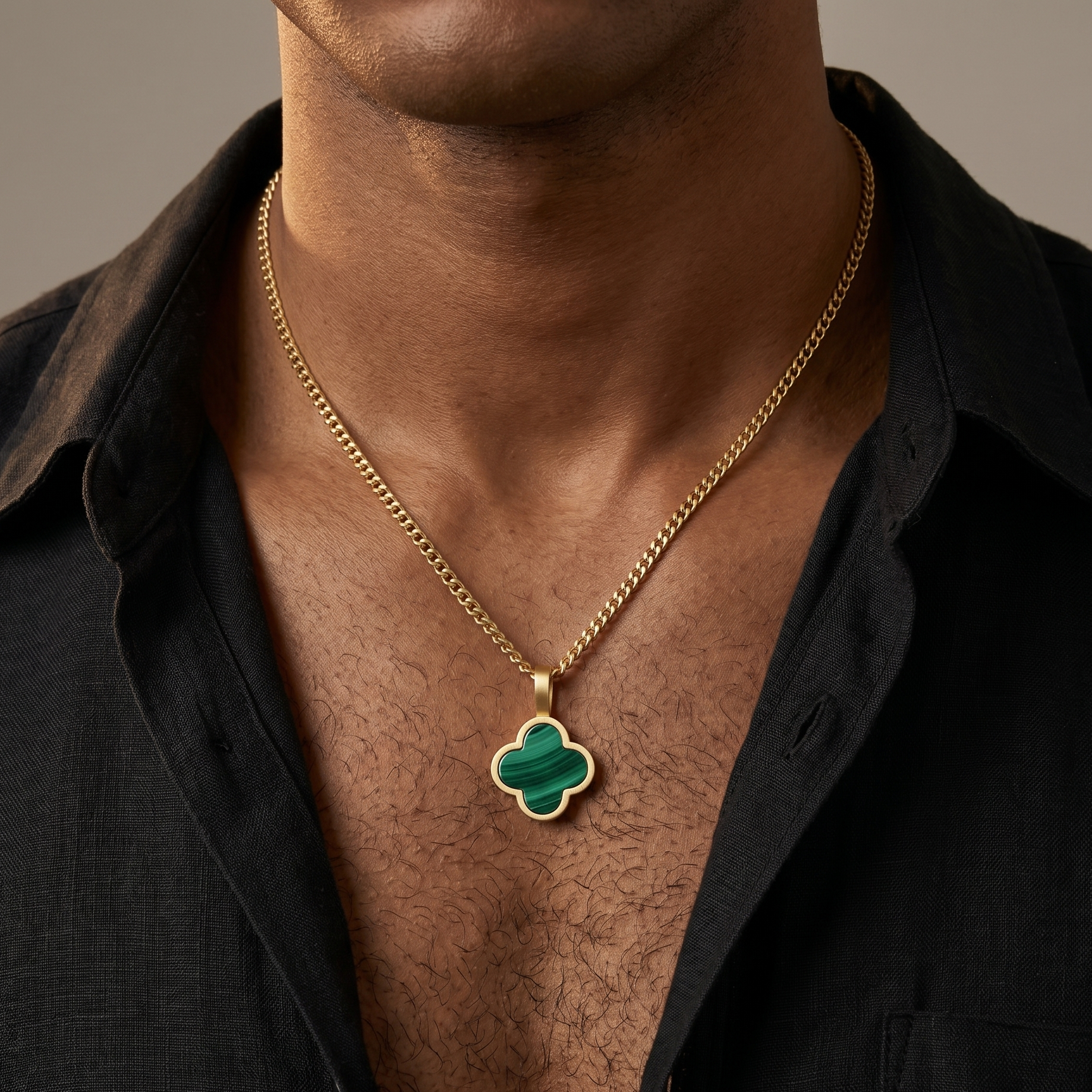 Man wearing a Malachite green stone necklace