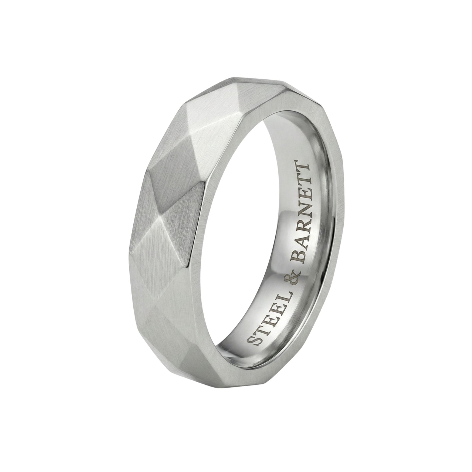 Silver stainless steel men's ring with a brushed faceted geometric design isolated on a white background