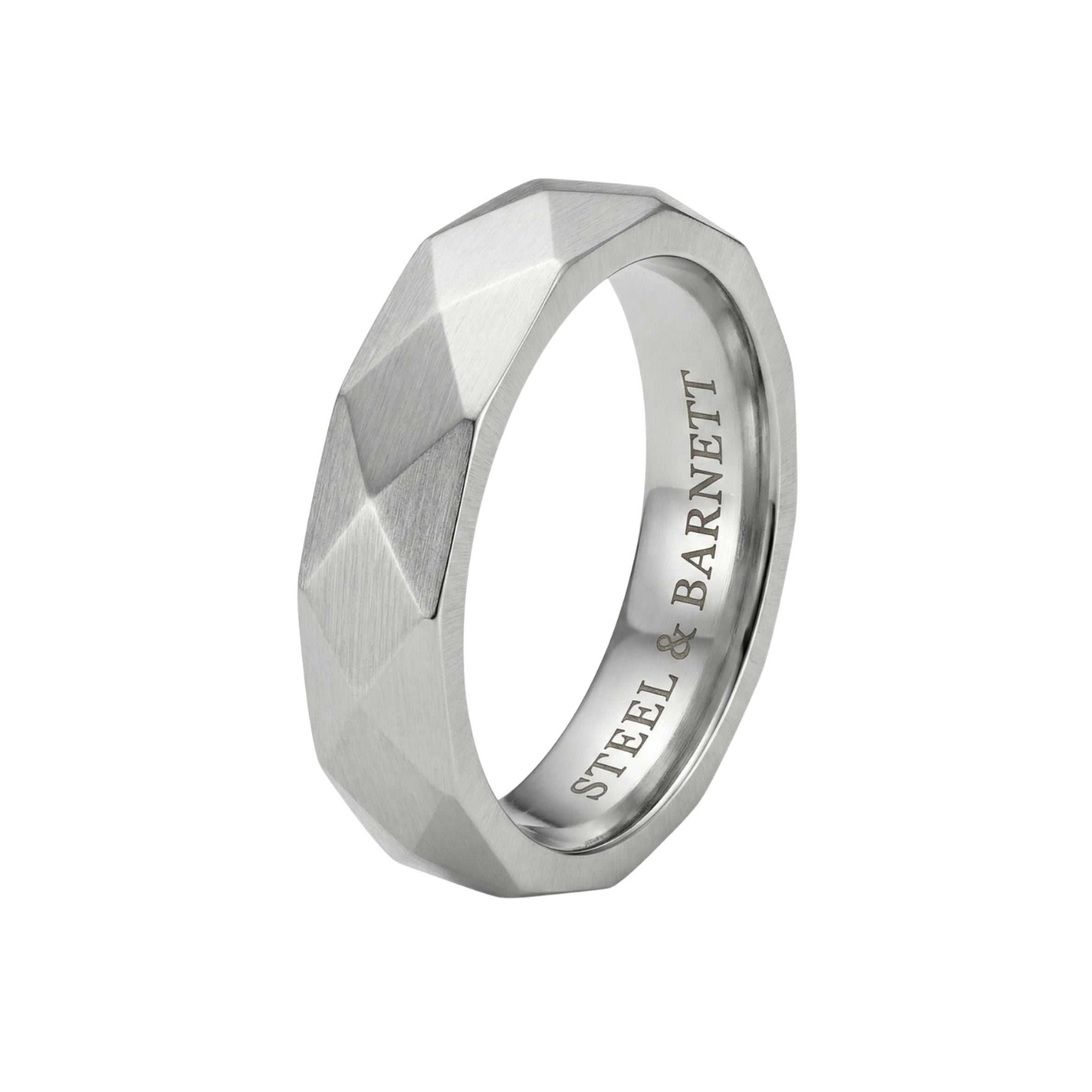 Silver stainless steel men's ring with a brushed faceted geometric design isolated on a white background
