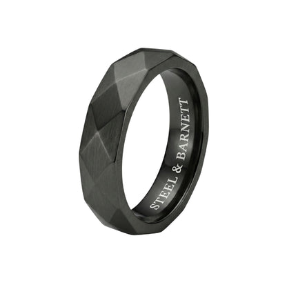 Black stainless steel men's ring with a brushed faceted geometric design isolated on a white background