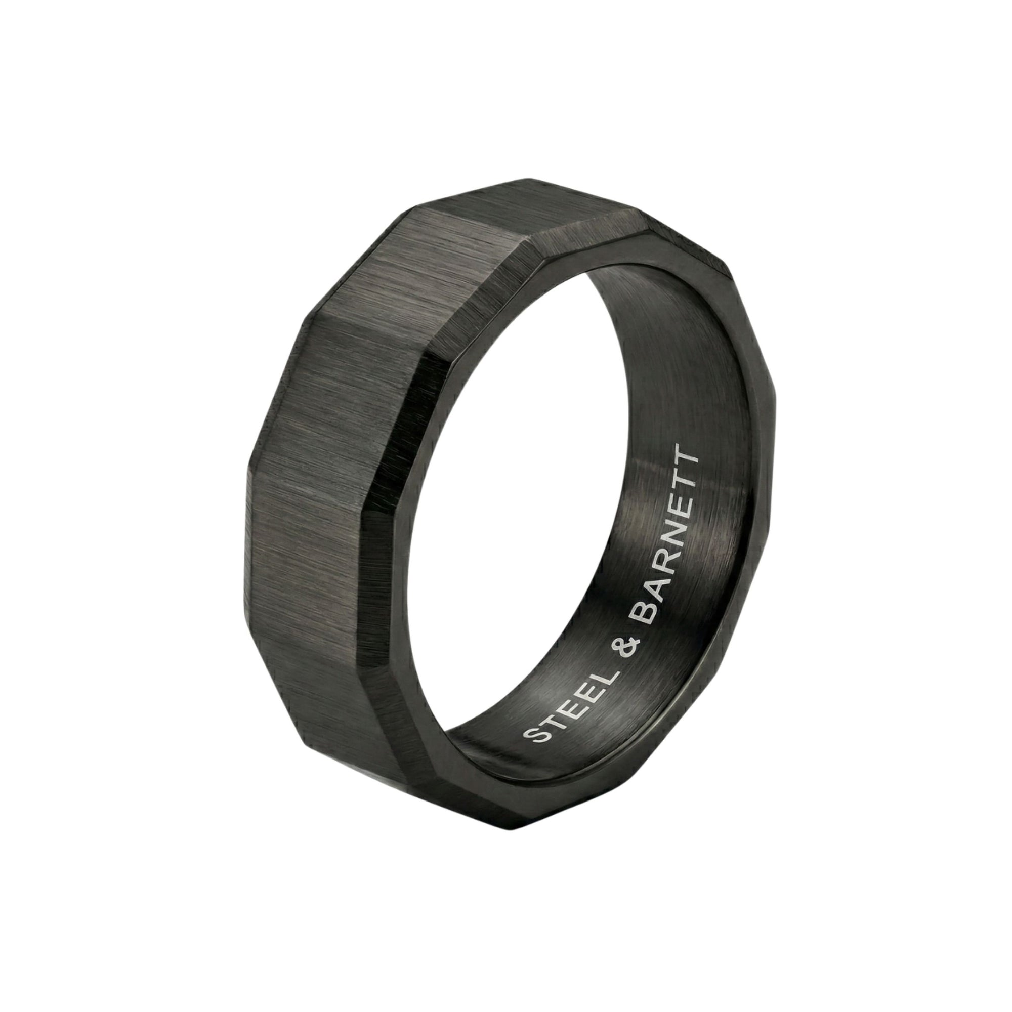 Black stainless steel men's ring with a brushed geometric design isolated on a white background