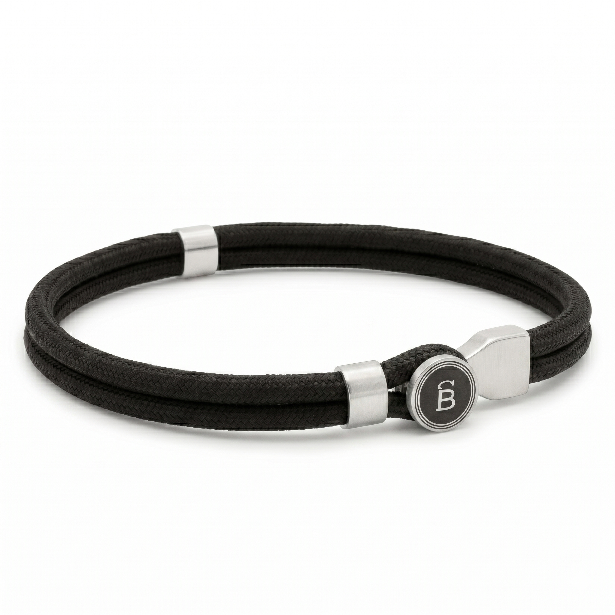 Black rope men’s bracelet with brushed stainless steel magnetic clasp and round logo detail on a white background