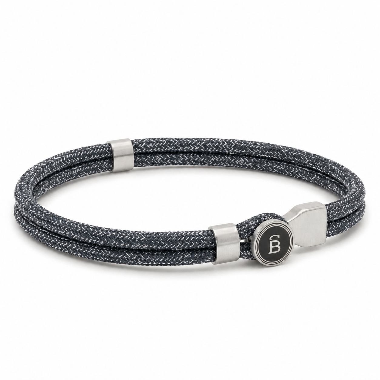 Grey braided rope men’s bracelet with brushed stainless steel magnetic clasp and round logo detail on a white background