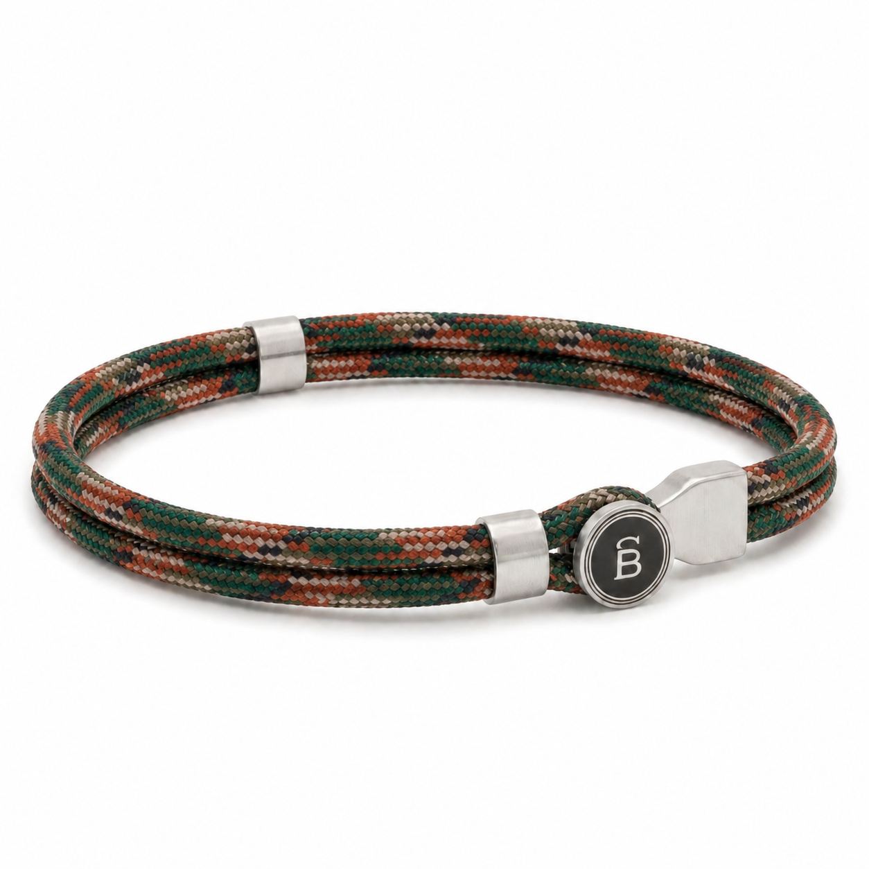 Green and brown patterned rope men’s bracelet with brushed stainless steel magnetic clasp and round logo detail on a white background