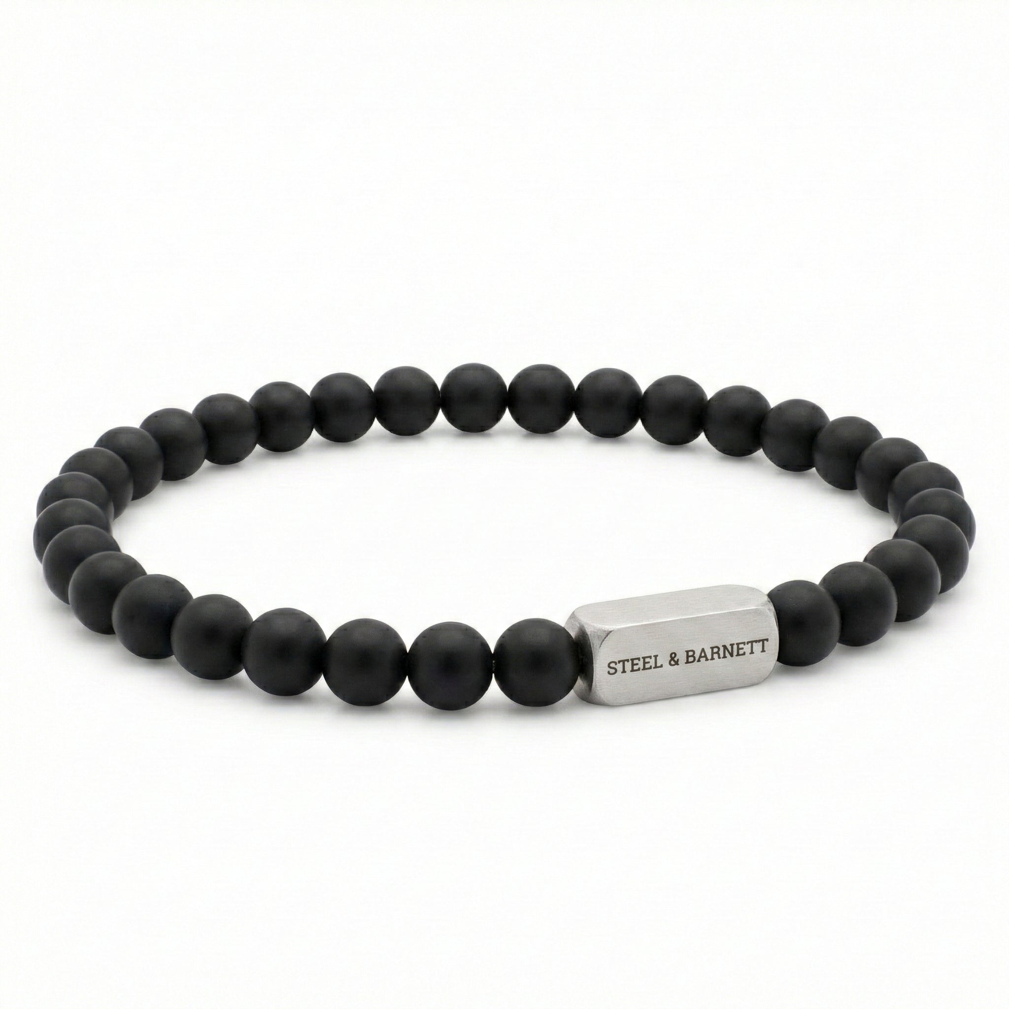black beaded men’s bracelet with matte round beads and brushed stainless steel bar on white background