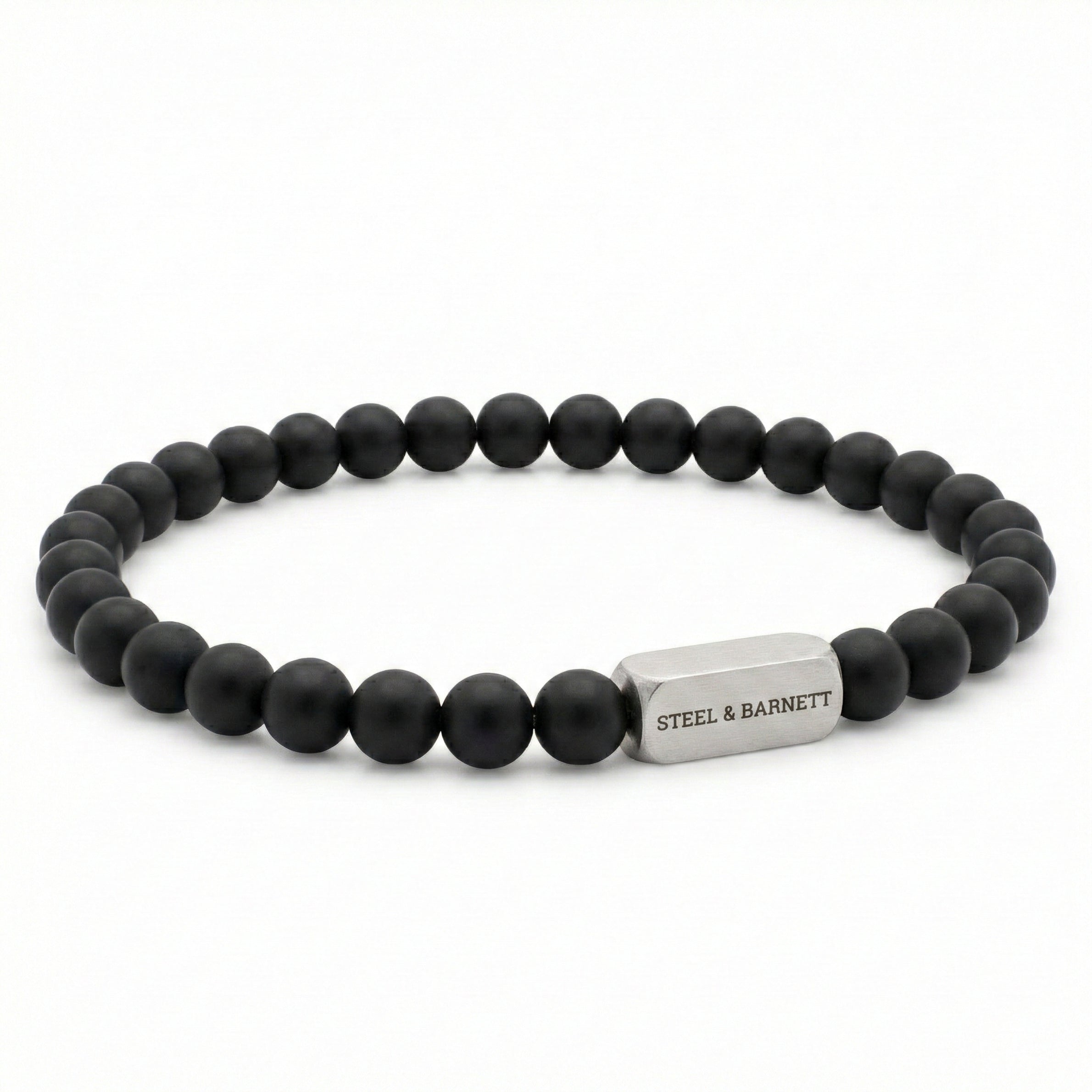 black beaded men’s bracelet with matte round beads and brushed stainless steel bar on white background
