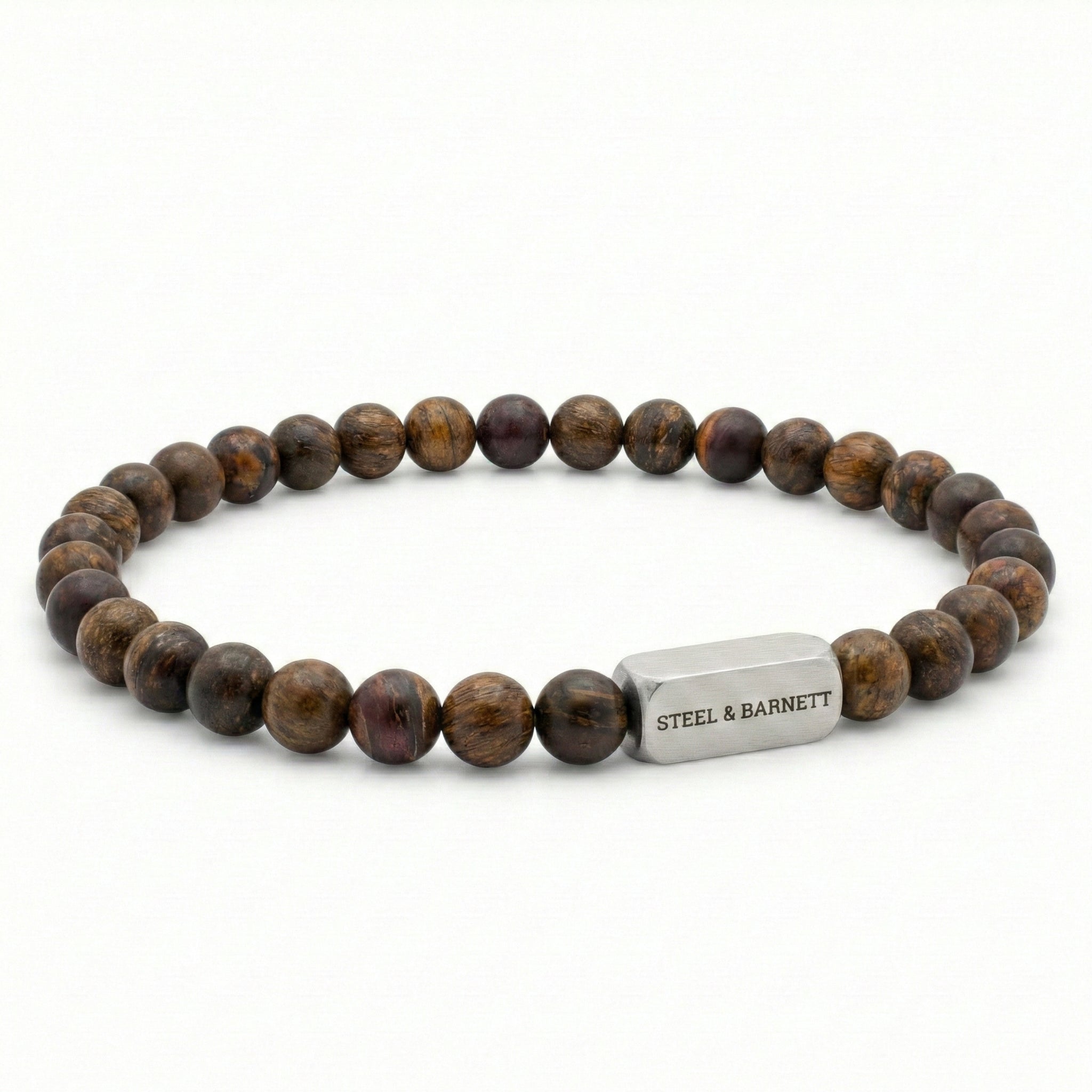 Bronzite beaded men’s bracelet with round brown natural stone beads and brushed stainless steel bar on white background