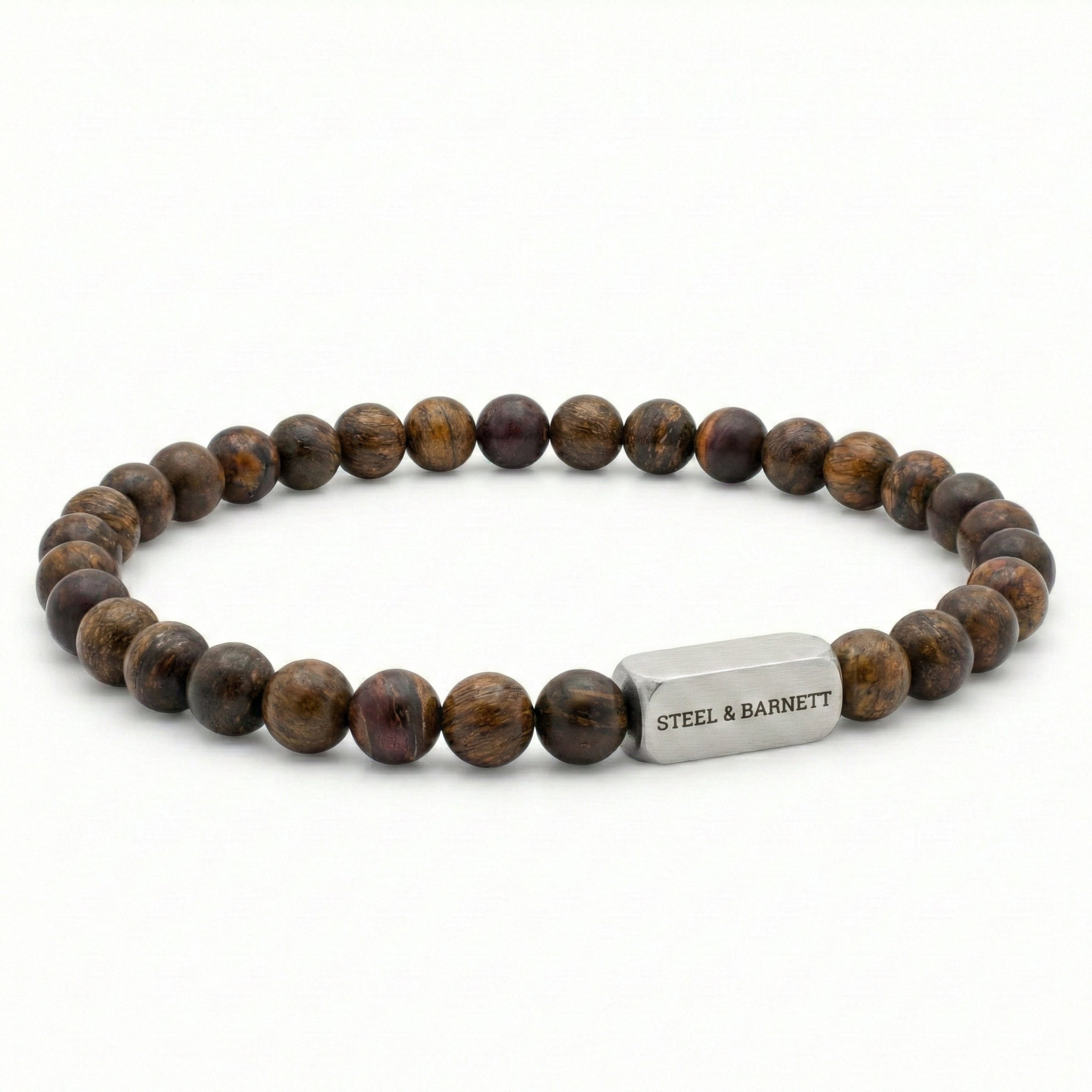 Bronzite beaded men’s bracelet with round brown natural stone beads and brushed stainless steel bar on white background