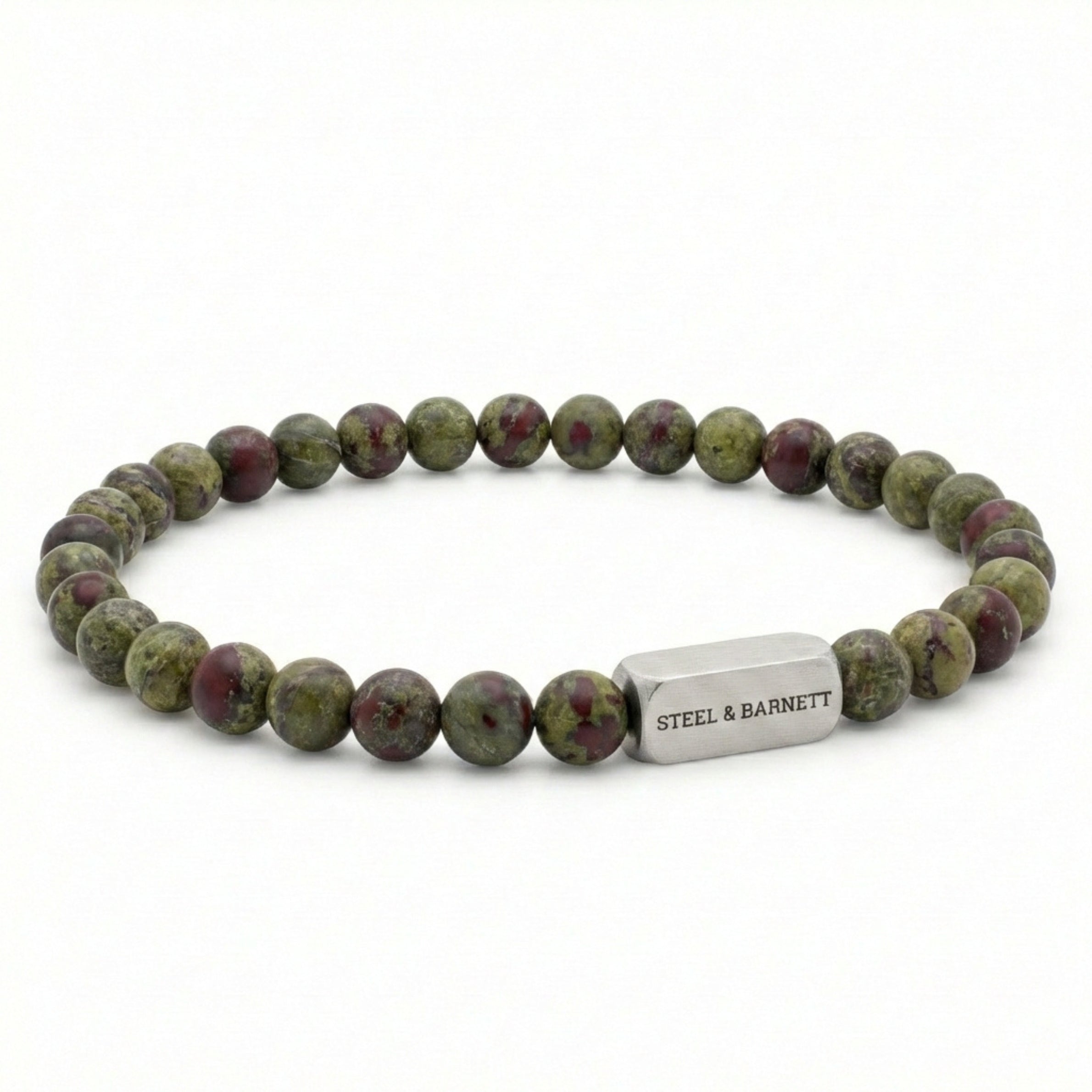 Dragon blood jasper men’s bracelet with green and red natural stone beads and brushed stainless steel bar on white background