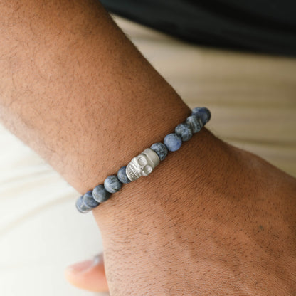 blue and silver stainless steel bracelet by steel and barnett