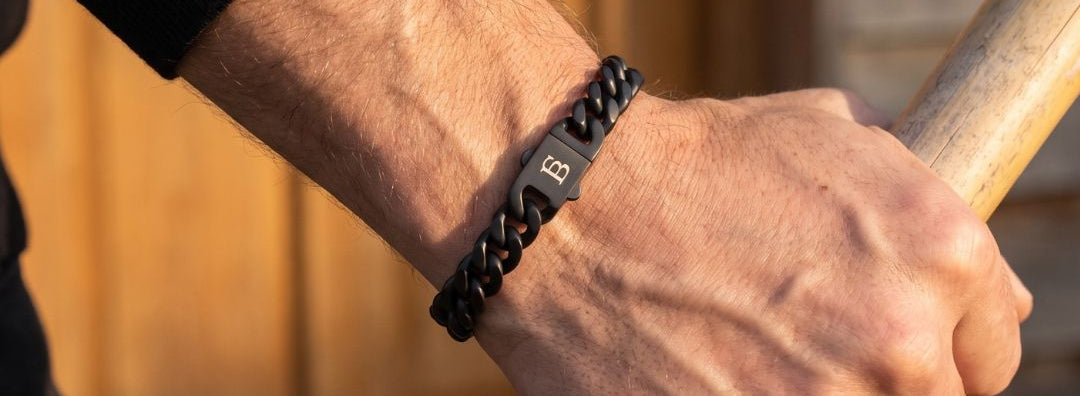 man wearing a cuban chain bracelet