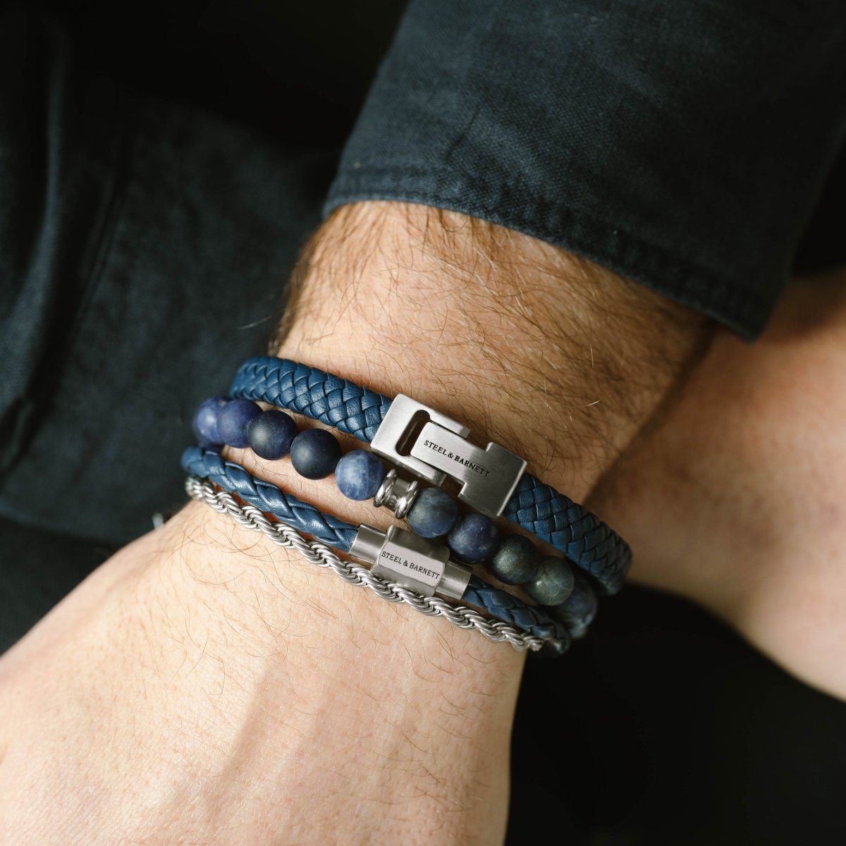 stainless steel blue leather bracelets layered with sodalite bead bracelet and stainless steel rope chain bracelet