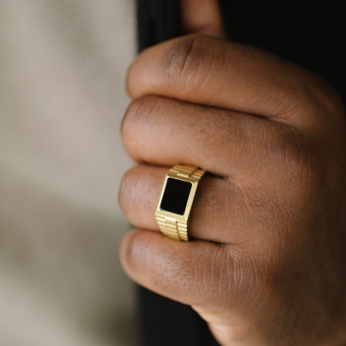 Black Onyx Signet Ring In 18K Plated Gold on finger