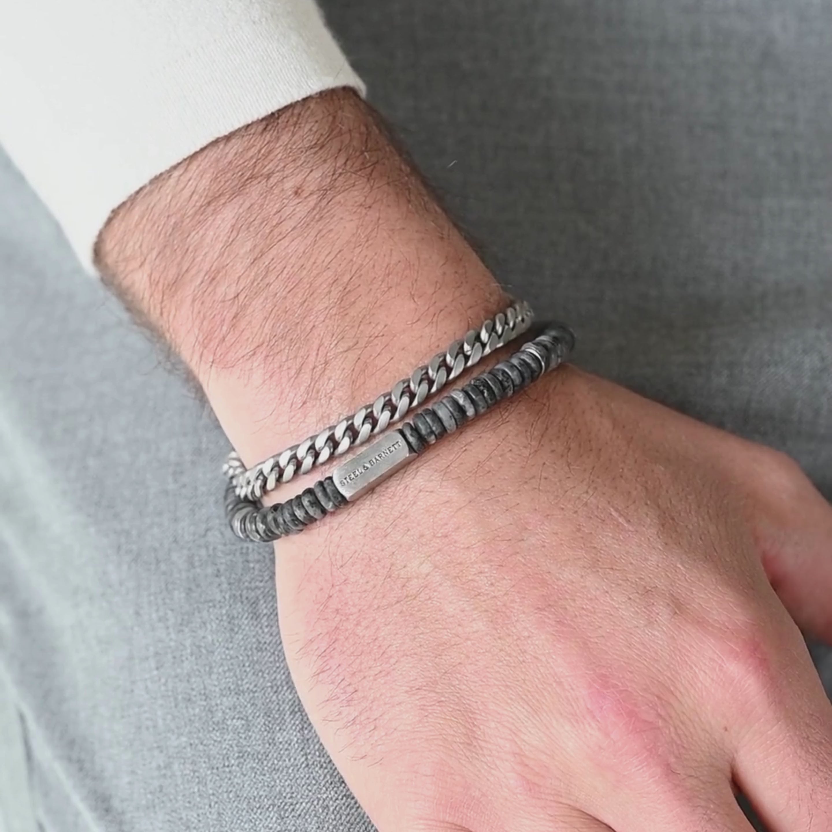 stainless steel link chain bracelet stacked with earthy two-tone matte labradorite gemstone disc bracelet